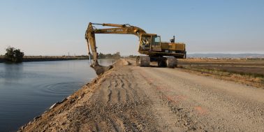 KG_dutch_slough_17096_08_02_18 An excavator cuts material along a levee