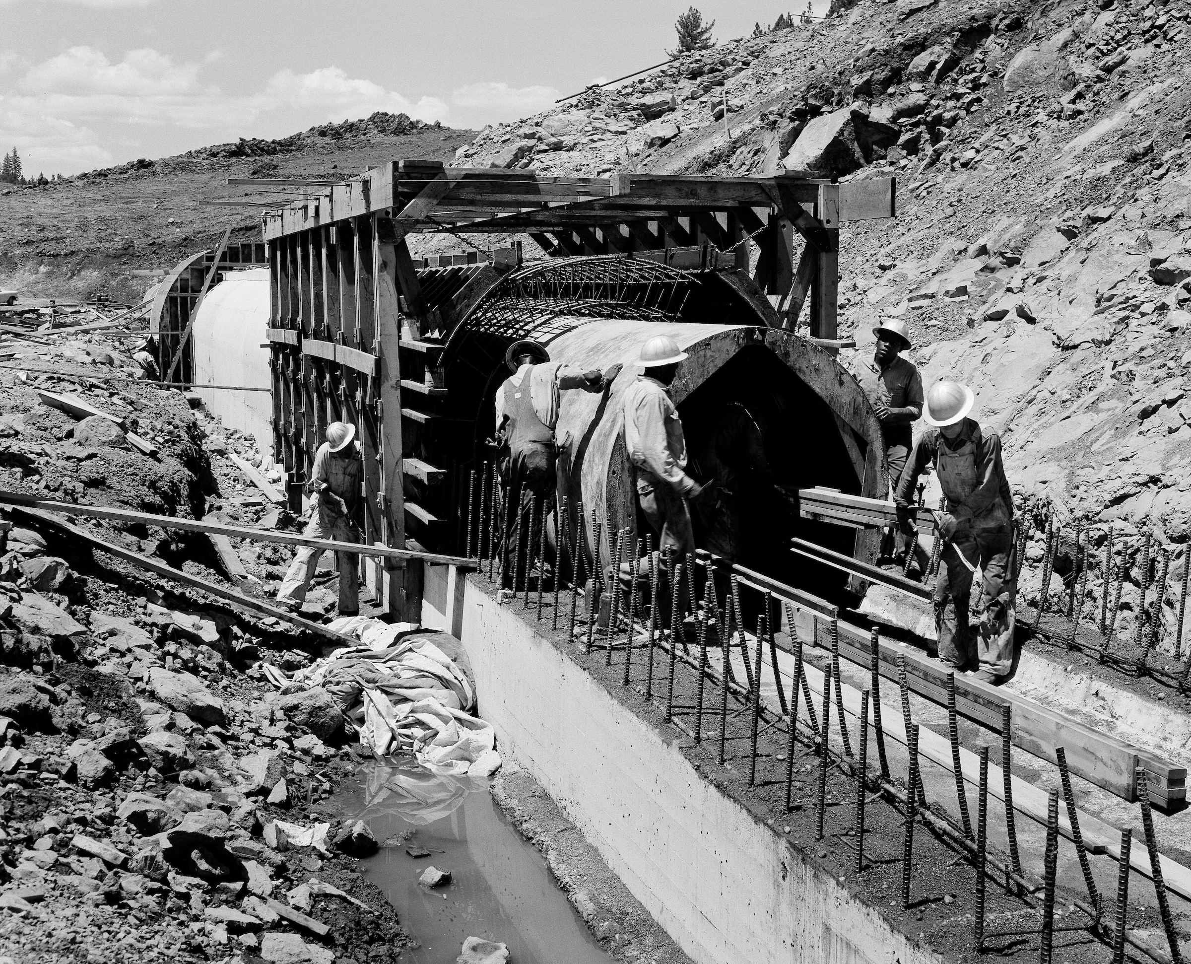 A construction crew works on the outlet conduit at the Frenchman damsite in southeastern Plumas County, California.