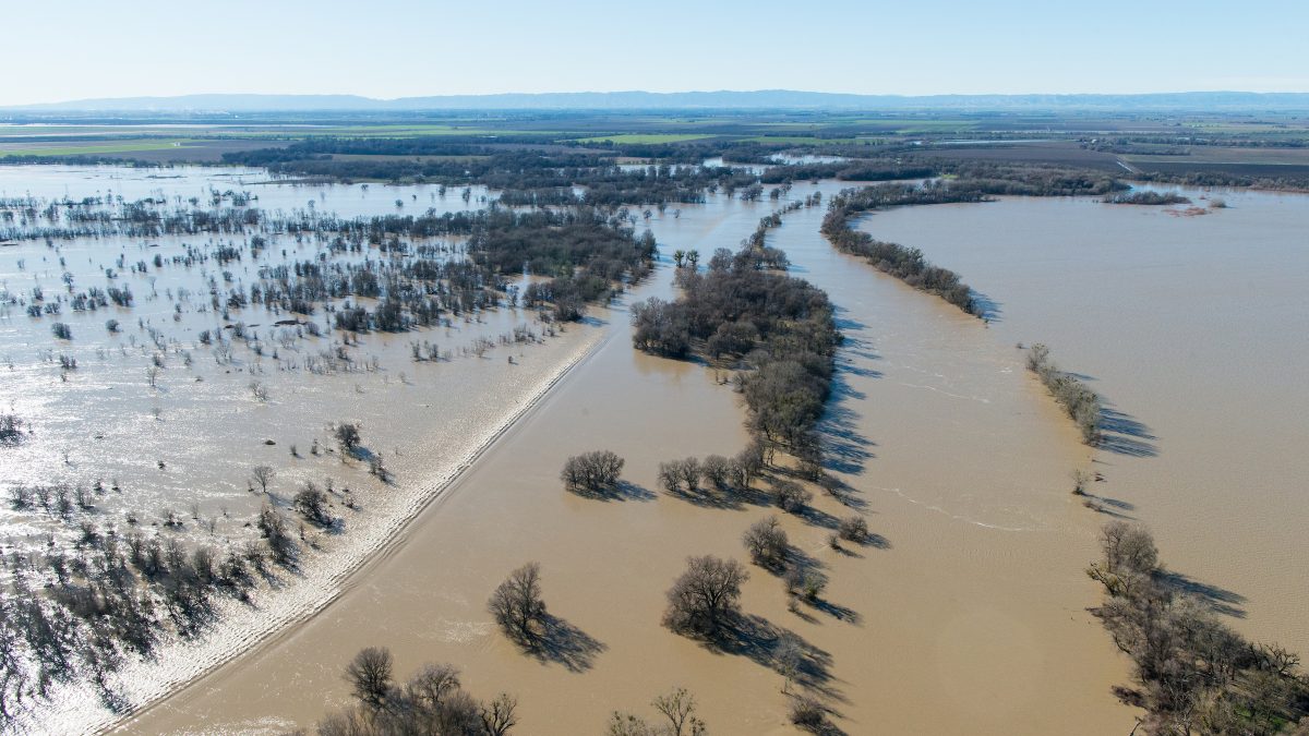 Aerial view of floodwaters overtopping the Fremont Weir in Knights Landing, Calif.